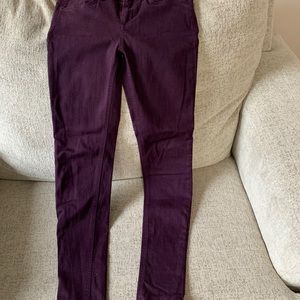 Purple mid-size skinny jeans